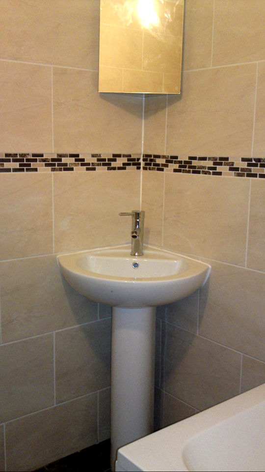 Bathroom Ideas, new wash basin & bathroom tiling by Handyman Yorkshire